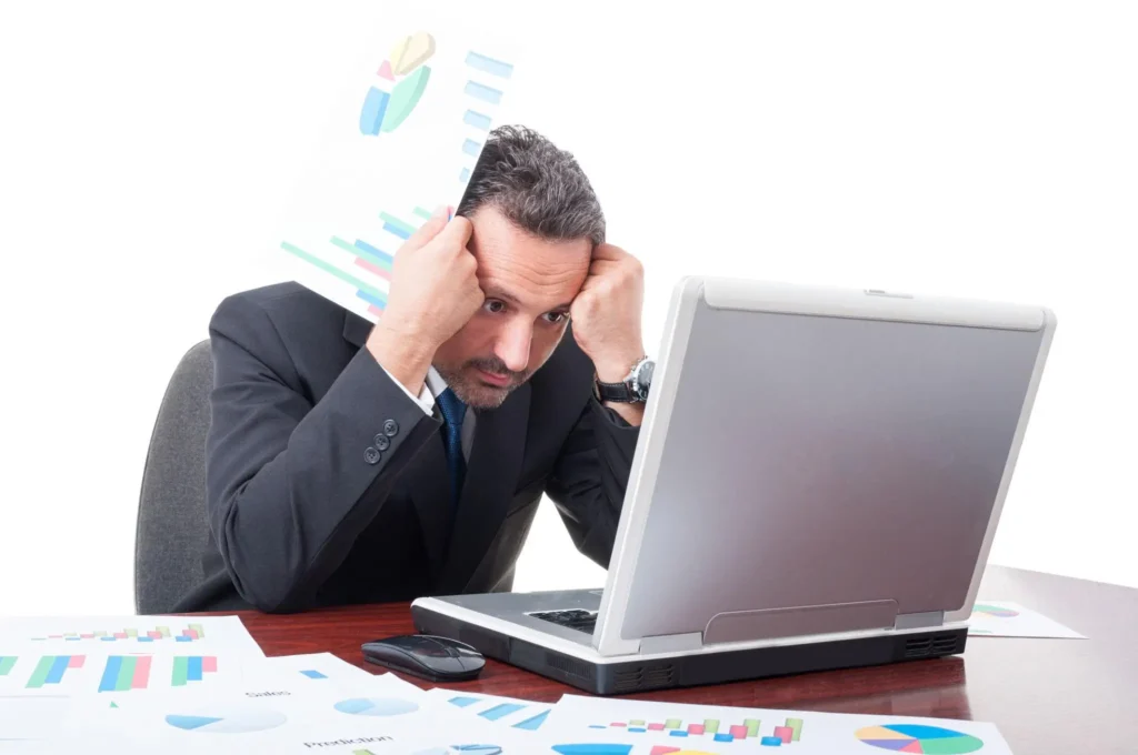 Business owner reviewing accounting and reconciliation problems